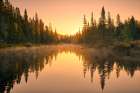 Canada-Ontario-Lake Superior Provincial Park Sunrise forest reflection in waterway Art Print